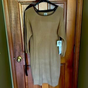 Anne Klein never been worn sweater type dress. Belt buckle has some marking